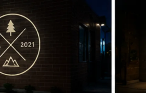 Heritage Crest projected on the wall in light