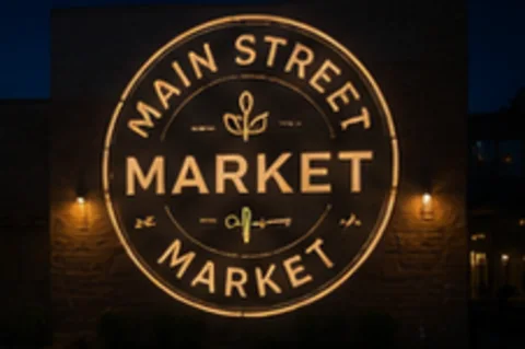 Main Street Market projected on the wall in light