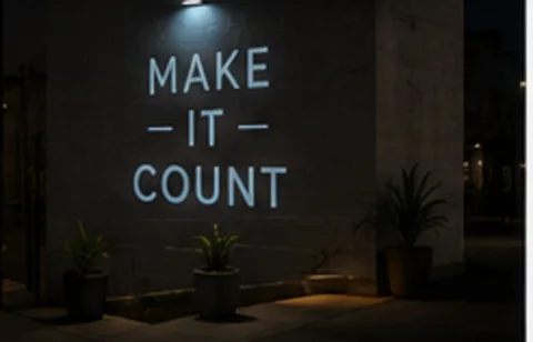 Make It Count projected on the wall in light