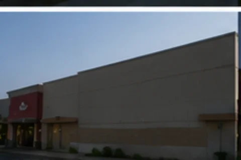 Blank wall before projection — Shop. Dine. Enjoy.