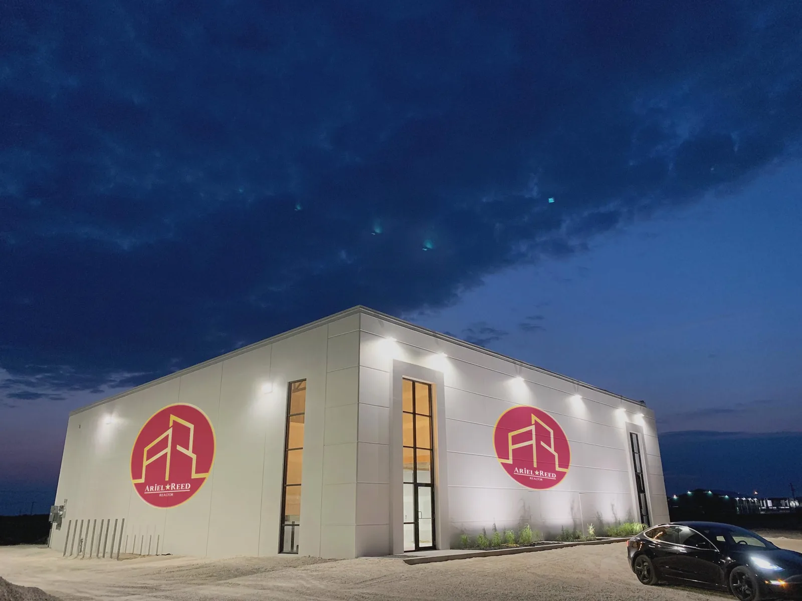 Building exterior branding — dark facade — Dark setting