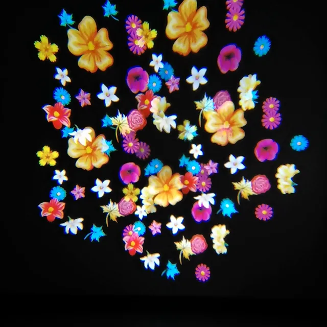 PentaScope 5-Prism effect projecting a mixed flower gobo design, multiplied into a 5-point star cluster