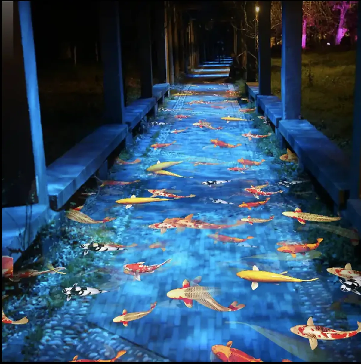 Corridor floor transformed into a glowing koi pond by an interactive projector