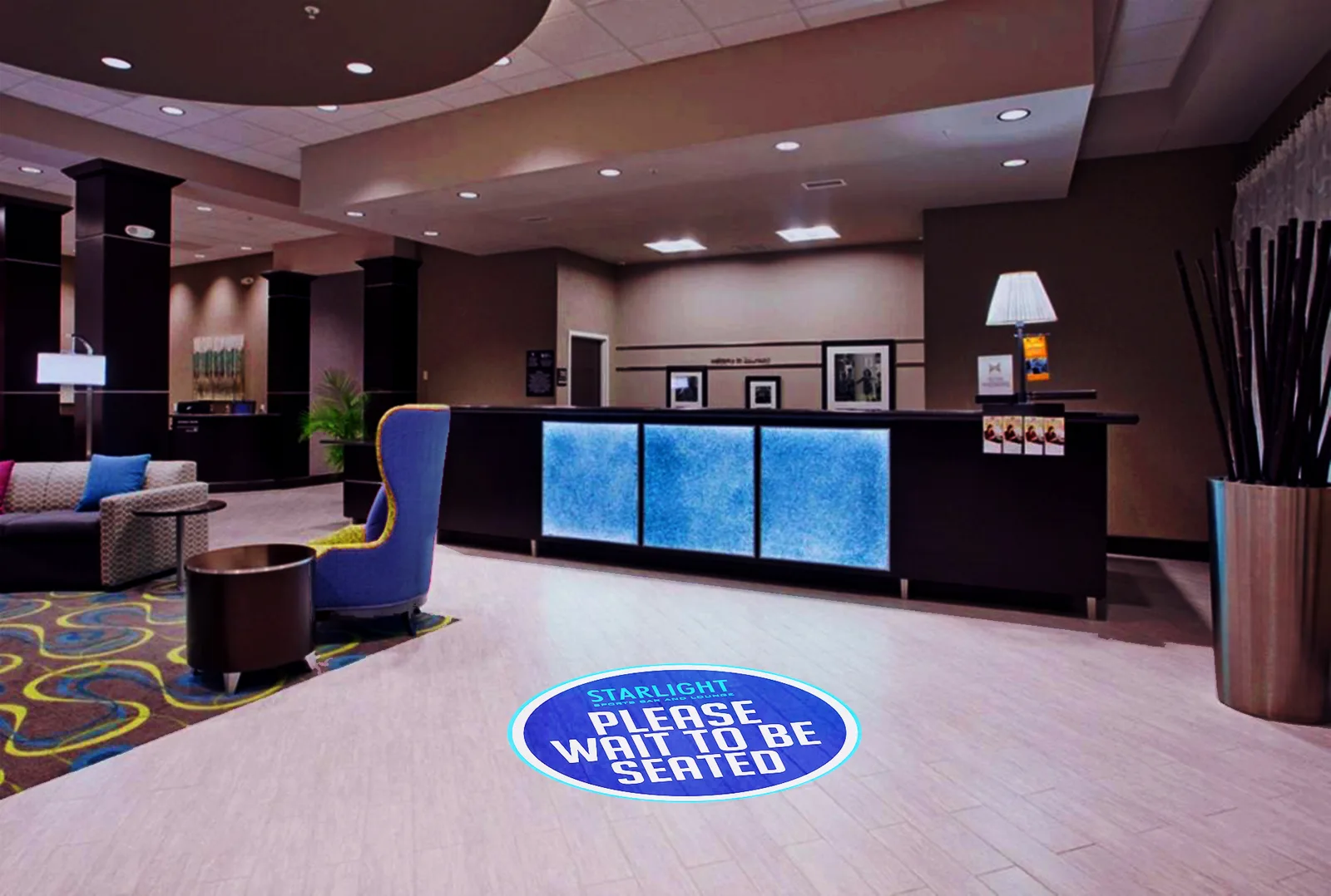 Corporate logo projected in an office reception area