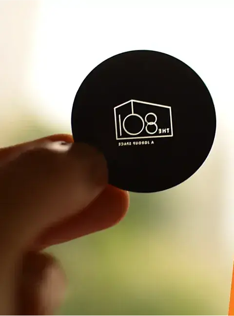 "THE 8" venue's real custom gobo disc held in hand