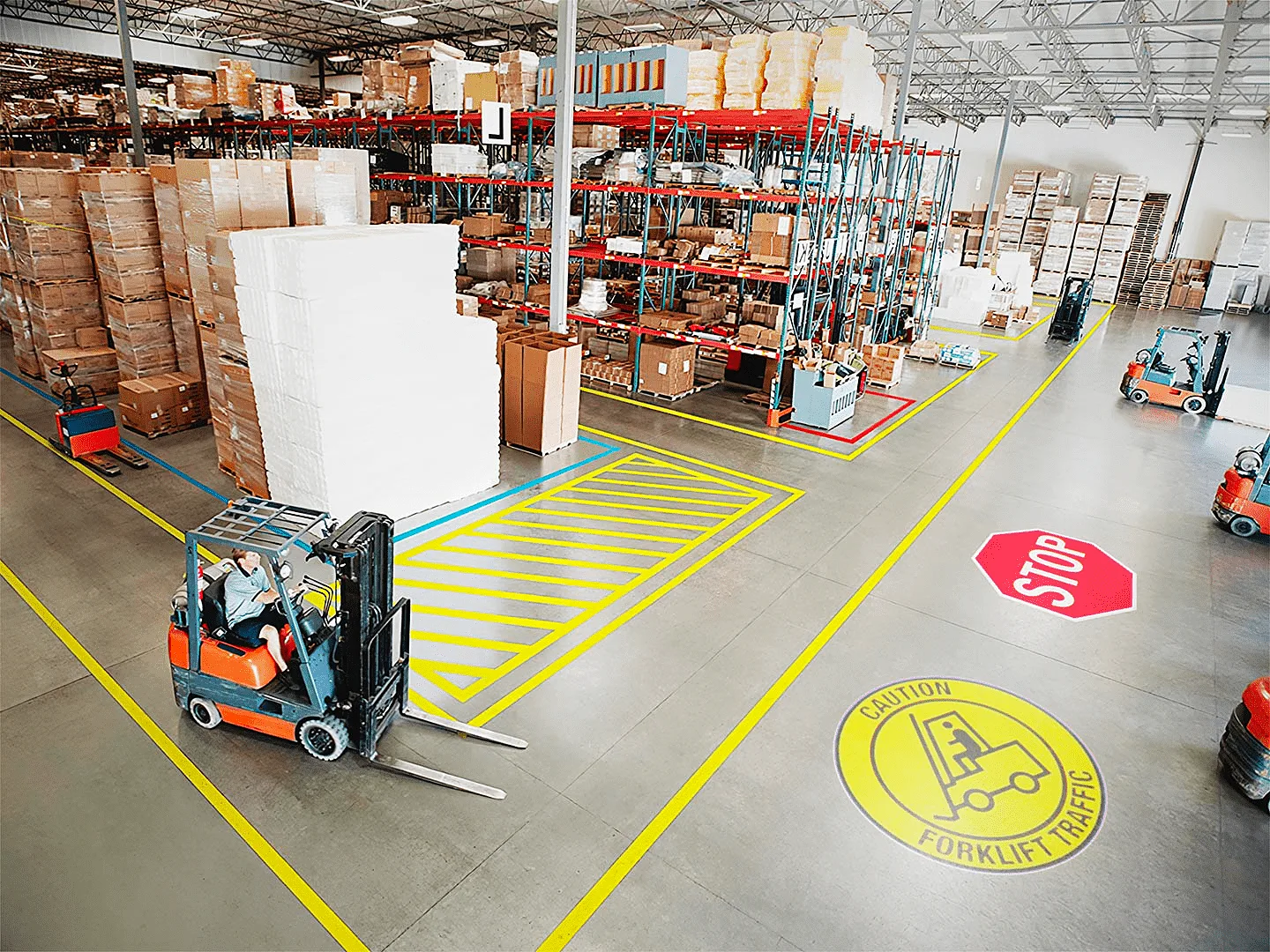Forklift caution sign projected on a warehouse floor — safety gobo projector