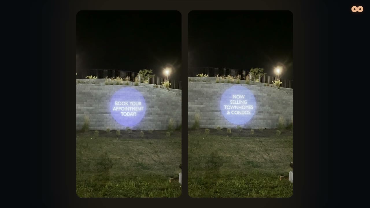 A real client logo lighting a property wall at dusk