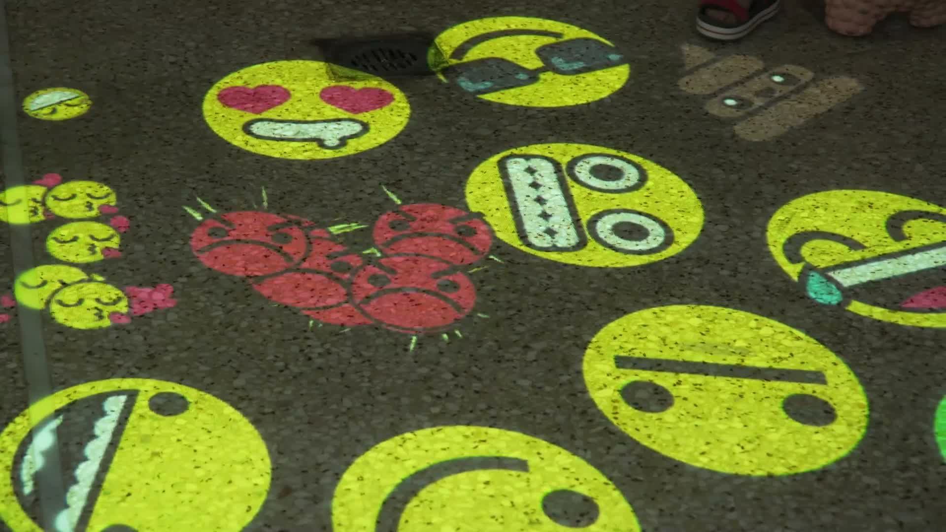 Kids play an interactive emoji floor game — real library install